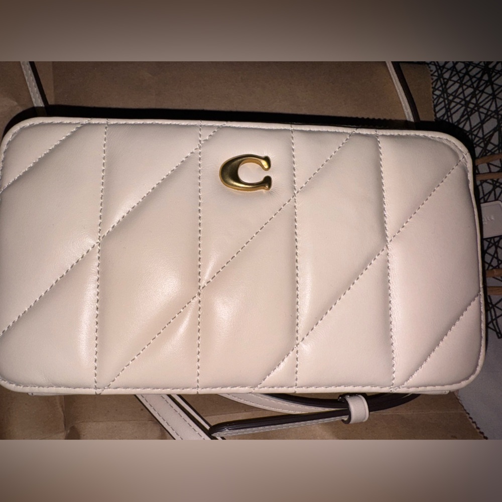 Elegant COACH Cream Quilted Women's Crossbody with wristlet